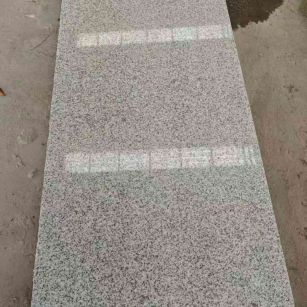 宜春芝麻白光面毛板